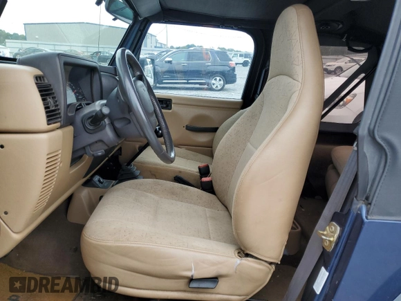 2002 Jeep Wrangler Sport with VIN 1J4FA49S62P704405, listed as a Copart auction lot 74531924 with 0 mi miles and Salvage Title. Bid and sale history available at carsss.com. Image 7.