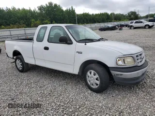 1999 Ford F-150 with VIN 1FTZX1728XNA67734, listed as a Copart auction lot 61195845 with Not provided miles and Salvage title. Bid and sale history available at DreamBid. Image 4.