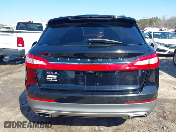 2016 Lincoln MKX Select with VIN 2LMTJ6KR9GBL59252, listed as a IAAI auction lot 41608092 with 144,128 mi miles. Bid and sale history available at carsss.com. Image 16.