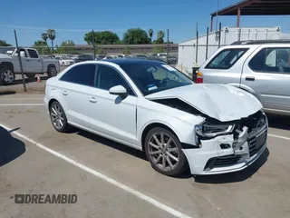 2015 Audi A3 Premium with VIN WAUACGFF9F1002975, listed as a IAAI auction lot 42084239 with 89,187 mi miles and . Bid and sale history available at DreamBid. Image 1.
