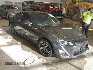 2013 Scion FR-S with VIN JF1ZNAA12D1710478, listed as a IAAI auction lot 41691958 with 89,969 mi miles. Bid and sale history available at carsss.com. Image 1.