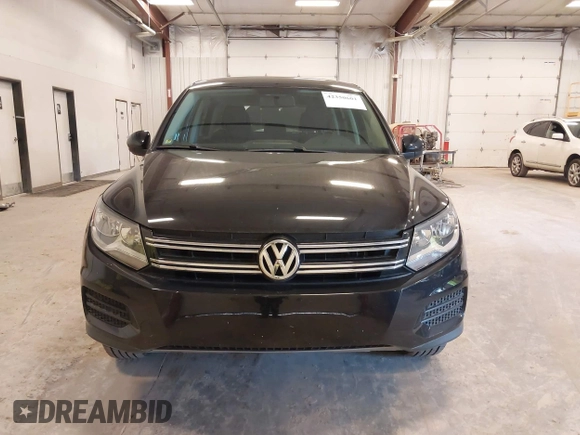 2014 Volkswagen Tiguan SE z VIN WVGAV3AX9EW614094, wystawiony jako IAAI lot #42350601 z przebiegiem 128 996 mil mil oraz . Historia ofert i sprzedaży dostępna na DreamBid. Obrazek 13.