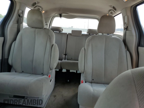 2012 Toyota Sienna с VIN 5TDZK3DCXCS198708, выставлен на аукционе Copart как лот 62806745 с пробегом 172 460 миль миль и Списание • Salvage title. История ставок и продаж доступна на DreamBid. Изображение 10.