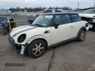 2010 MINI Hardtop with VIN WMWMF3C51ATZ63088, listed as a Copart auction lot 51701325 with 38,544 mi miles and Salvage Title. Bid and sale history available at DreamBid. Image 1.