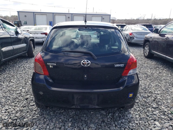 2009 Toyota Yaris with VIN JTDKT903395225334, listed as a Copart auction lot 50764035 with 117,561 mi miles and Clean Title. Bid and sale history available at carsss.com. Image 6.