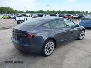 2021 Tesla Model 3 Long Range with VIN 5YJ3E1EB4MF855581, listed as a IAAI auction lot 41974515 with 71,561 mi miles. Bid and sale history available at carsss.com. Image 4.