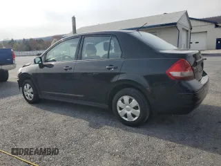 2010 Nissan Versa 1.6 with VIN 3N1CC1AP2AL353742, listed as a Copart auction lot 51812995 with 171,690 mi miles and Salvage title. Bid and sale history available at DreamBid. Image 2.