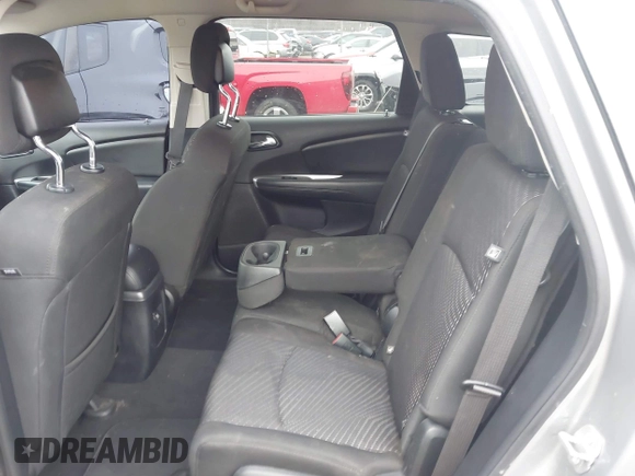 2019 Dodge Journey SE with VIN 3C4PDCBG9KT869149, listed as a IAAI auction lot 41472289 with 97,333 mi miles and . Bid and sale history available at DreamBid. Image 8.
