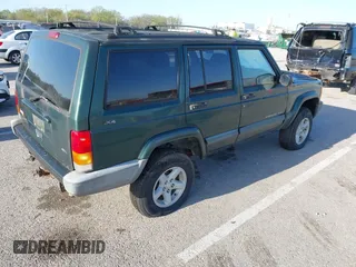1999 Jeep Cherokee Sport with VIN 1J4FF68SXXL677013, listed as a IAAI auction lot 41993355 with 228,722 mi miles. Bid and sale history available at carsss.com. Image 4.