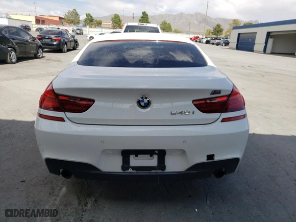 2015 BMW 6 Series 640i with VIN WBA6A0C59FGB53555, listed as a Copart auction lot 67128254 with 99,503 mi miles and Salvage Title. Bid and sale history available at carsss.com. Image 6.