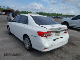 2012 Toyota Corolla L with VIN 5YFBU4EE5CP044613, listed as a IAAI auction lot 42113624 with 208,780 mi miles and . Bid and sale history available at carsss.com. Image 3.