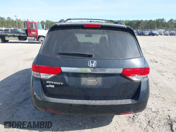 2015 Honda Odyssey EX-L with VIN 5FNRL5H65FB088106, listed as a IAAI auction lot 41880915 with 176,539 mi miles and . Bid and sale history available at carsss.com. Image 16.