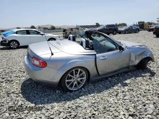 2010 Mazda MX-5 Miata Grand Touring with VIN JM1NC2FF5A0205190, listed as a Copart auction lot 61372455 with 147,852 mi miles and Salvage title. Bid and sale history available at DreamBid. Image 3.