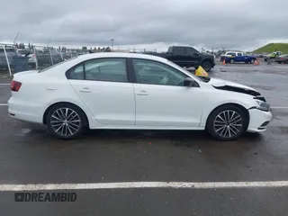 2016 Volkswagen Jetta Sedan 1.8T Sport with VIN 3VWD17AJ3GM404199, listed as a IAAI auction lot 41934993 with 43,183 mi miles. Bid and sale history available at carsss.com. Image 14.
