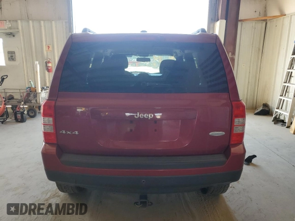 2014 Jeep Patriot Latitude with VIN 1C4NJRFB3ED792919, listed as a Copart auction lot 66043945 with 142,224 mi miles and Salvage title. Bid and sale history available at DreamBid. Image 6.