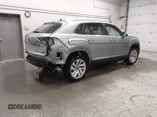 2023 Volkswagen Atlas SE z VIN 1V2KC2CA6PC210593, wystawiony jako IAAI lot #41957633 z przebiegiem 34 801 mil mil oraz . Historia ofert i sprzedaży dostępna na DreamBid. Obrazek 4.