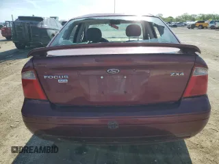 2006 Ford Focus S z VIN 1FAHP34N36W250236, wystawiony jako Copart lot #53794555 z przebiegiem 198 791 mil mil oraz Szkody całkowita. Historia ofert i sprzedaży dostępna na DreamBid. Obrazek 6.
