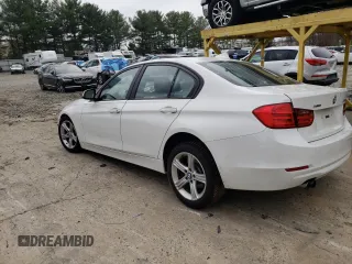 2013 BMW 3 Series 328i xDrive with VIN WBA3B5G59DNS04579, listed as a Copart auction lot 50445404 with 115,404 mi miles and Salvage title. Bid and sale history available at DreamBid. Image 2.