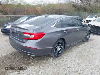 2021 Honda Accord Touring with VIN 1HGCV3F90MA001513, listed as a IAAI auction lot 41939003 with 107,246 mi miles and . Bid and sale history available at DreamBid. Image 4.