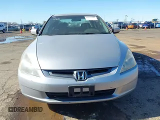 2003 Honda Accord LX with VIN JHMCM56303C043710, listed as a IAAI auction lot 41517509 with 283,083 mi miles and . Bid and sale history available at DreamBid. Image 6.