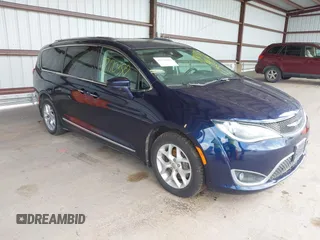 2017 Chrysler Pacifica Touring L Plus with VIN 2C4RC1EG7HR559489, listed as a IAAI auction lot 42170387 with 127,794 mi miles and . Bid and sale history available at DreamBid. Image 1.