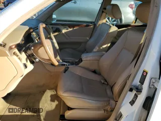 2002 Mercedes-Benz E-Class with VIN WDBJF65J62B423016, listed as a Copart auction lot 79806394 with 154,537 mi miles and Salvage Title. Bid and sale history available at carsss.com. Image 7.