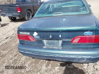 1995 Ford Taurus GL with VIN 1FALP52U2SA113070, listed as a IAAI auction lot 41869576 with 16,935 mi miles and . Bid and sale history available at DreamBid. Image 16.