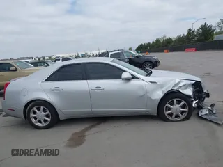 2009 Cadillac CTS RWD с VIN 1G6DF577690160058, выставлен на аукционе IAAI как лот 42108078 с пробегом 114 381 миль миль и . История ставок и продаж доступна на DreamBid. Изображение 13.