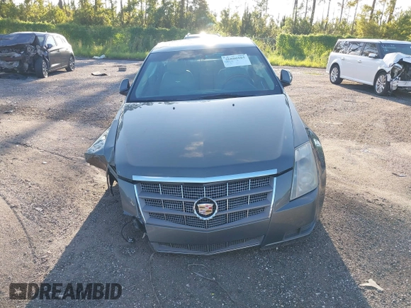 2011 Cadillac CTS Luxury with VIN 1G6DE5EY5B0154563, listed as a IAAI auction lot 36806985 with 92,635 mi miles and . Bid and sale history available at DreamBid. Image 12.