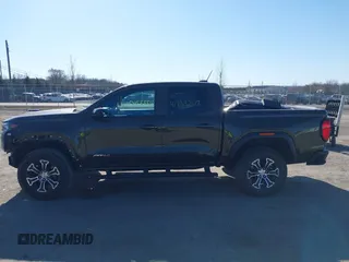 2023 GMC Canyon 4WD AT4 with VIN 1GTP6DEK1P1174713, listed as a IAAI auction lot 41733242 with 35,705 mi miles. Bid and sale history available at carsss.com. Image 14.