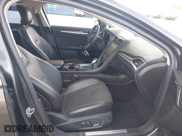 2016 Ford Fusion Titanium with VIN 3FA6P0SU9GR134575, listed as a IAAI auction lot 42338427 with 123,765 mi miles and . Bid and sale history available at DreamBid. Image 5.