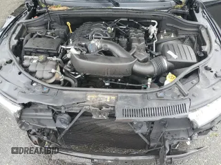 2023 Dodge Durango SXT with VIN 1C4RDHAG5PC634936, listed as a Copart auction lot 57282195 with 56,689 mi miles and Salvage title. Bid and sale history available at DreamBid. Image 12.