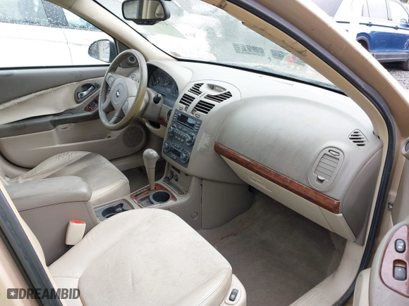 2004 Chevrolet Malibu LT with VIN 1G1ZU548X4F246722, listed as a IAAI auction lot 41846487 with 122,560 mi miles. Bid and sale history available at carsss.com. Image 5.