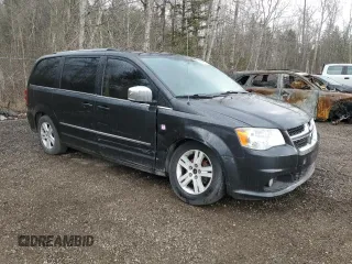 2011 Dodge Grand Caravan Crew with VIN 2D4RN5DG2BR762738, listed as a Copart auction lot 49528955 with 203,748 mi miles and Clean Title. Bid and sale history available at DreamBid. Image 4.