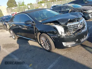 2014 Cadillac XTS Luxury with VIN 2G61M5S31E9290150, listed as a IAAI auction lot 41653055 with 174,553 mi miles. Bid and sale history available at carsss.com. Image 1.