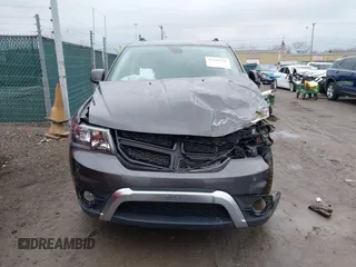 2020 Dodge Journey Crossroad z VIN 3C4PDCGB4LT271100, wystawiony jako IAAI lot #41552975 z przebiegiem 74 400 mil mil oraz . Historia ofert i sprzedaży dostępna na DreamBid. Obrazek 13.