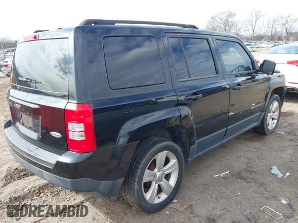 2013 Jeep Patriot Latitude with VIN 1C4NJPFA7DD213134, listed as a IAAI auction lot 41472480 with 176,068 mi miles. Bid and sale history available at carsss.com. Image 4.
