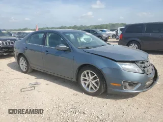 2012 Ford Fusion SEL with VIN 3FAHP0JA6CR412195, listed as a Copart auction lot 60922115 with 266,219 mi miles and Salvage title. Bid and sale history available at DreamBid. Image 4.