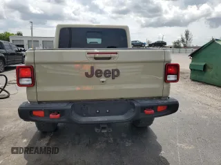 2022 Jeep Gladiator Rubicon с VIN 1C6JJTBG2NL171598, выставлен на аукционе Copart как лот 59494925 с пробегом 46 097 миль миль и Списание • Salvage title. История ставок и продаж доступна на DreamBid. Изображение 6.