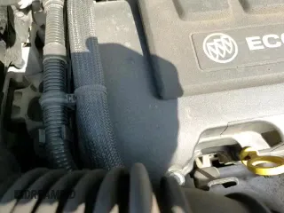 2017 Buick Encore Essence z VIN KL4CJGSB9HB135294, wystawiony jako Copart lot #65718115 z przebiegiem 81 469 mil mil oraz Szkoda całkowita • Salvage title. Historia ofert i sprzedaży dostępna na DreamBid. Obrazek 15.