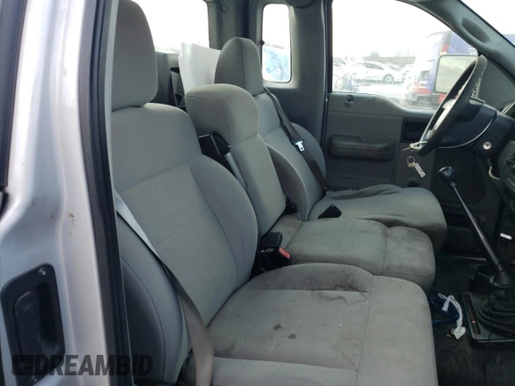 2007 Ford F-150 XL с VIN 1FTRF12247NA01532, выставлен на аукционе Copart как лот 55058495 с пробегом 132 823 миль миль и Списание • Salvage title. История ставок и продаж доступна на DreamBid. Изображение 10.