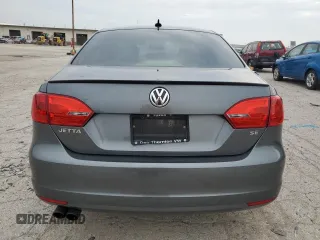 2014 Volkswagen Jetta SE with VIN 3VWD07AJ7EM363186, listed as a Copart auction lot 60873465 with 215,323 mi miles and Salvage title. Bid and sale history available at DreamBid. Image 6.