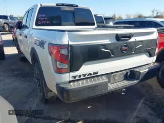 2021 Nissan Titan Pro-4X with VIN 1N6AA1ED5MN533759, listed as a IAAI auction lot 41203812 with 39,154 mi miles and . Bid and sale history available at DreamBid. Image 3.