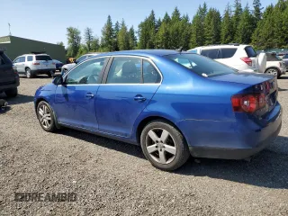 2008 Volkswagen Jetta SE z VIN 3VWRM71KX8M141684, wystawiony jako Copart lot #59432375 z przebiegiem 171 936 mil mil oraz Czysty tytuł • Clean title. Historia ofert i sprzedaży dostępna na DreamBid. Obrazek 2.