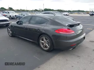 2015 Porsche Panamera 4 с VIN WP0AA2A71FL002436, выставлен на аукционе IAAI как лот 42479904 с пробегом 64 750 миль миль и . История ставок и продаж доступна на DreamBid. Изображение 3.