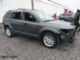 2016 Dodge Journey SXT with VIN 3C4PDDBG6GT215903, listed as a IAAI auction lot 41517196 with 146,671 mi miles. Bid and sale history available at carsss.com. Image 1.