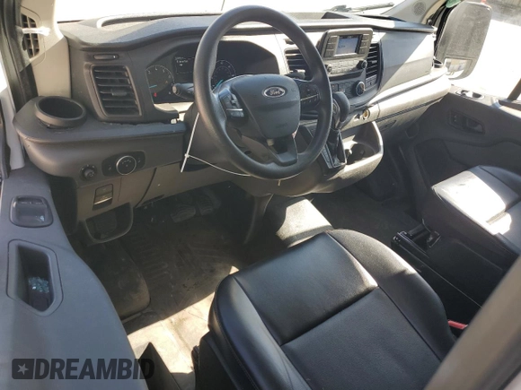 2021 Ford Transit Cargo с VIN 1FTBR1Y87MKA53352, выставлен на аукционе Copart как лот 43004615 с пробегом 74 384 миль миль и Чистый • Clean title. История ставок и продаж доступна на DreamBid. Изображение 8.