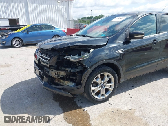 2013 Ford Escape SEL with VIN 1FMCU9HX1DUB97939, listed as a IAAI auction lot 42293561 with 196,951 mi miles and . Bid and sale history available at DreamBid. Image 6.