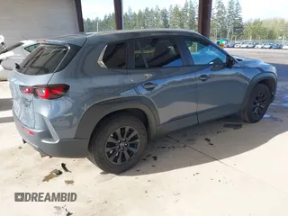 2023 Mazda CX-50 S Select with VIN 7MMVABAM2PN110674, listed as a IAAI auction lot 42014100 with 36,827 mi miles and . Bid and sale history available at DreamBid. Image 4.