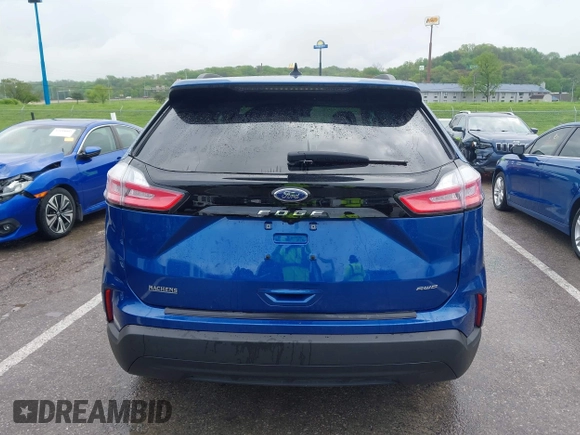 2024 Ford Edge SE z VIN 2FMPK4G93RBA72662, wystawiony jako IAAI lot #42097425 z przebiegiem 7 234 mil mil oraz . Historia ofert i sprzedaży dostępna na DreamBid. Obrazek 17.